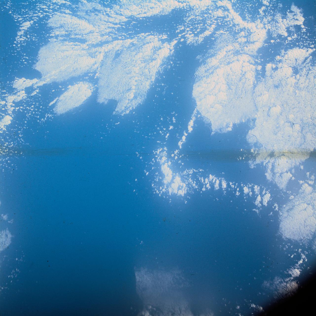 S62-06606 (3 Oct. 1962) --- Cloud formation over Western Atlantic Ocean north of South America taken during the fourth orbit pass of the Mercury-Atlas 8 (MA-8) mission by astronaut Walter M. Schirra Jr. with a hand-held camera. Photo credit: NASA