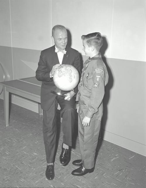 S62-00992 (1961) --- Mercury astronaut John Glenn looks into a Celestial Training Device (globe) during training in the Aeromedical Laboratory at Cape Canaveral, Florida.