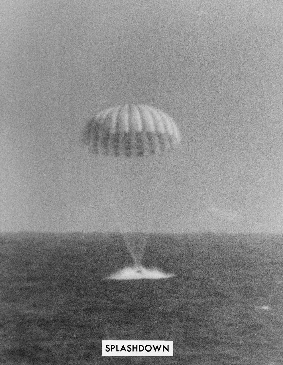 S63-00693 (3 Oct. 1962) --- Landing with parachute extended of astronaut Walter M. Schirra's Mercury-Atlas 8 (MA-8) capsule, called the Sigma 7, after a world orbital flight. Photo is labeled "Splashdown". Photo credit: NASA