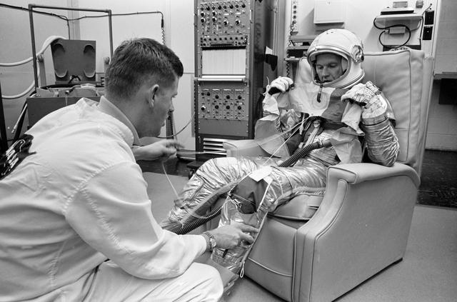 NASA image: ROCHFORD, AL - ASTRONAUT COOPER, GORDON L. - LIFE VEST CHECK - PRELAUNCH ACTIVITIES - MERCURY-ATLAS (MA)-9 - MSC