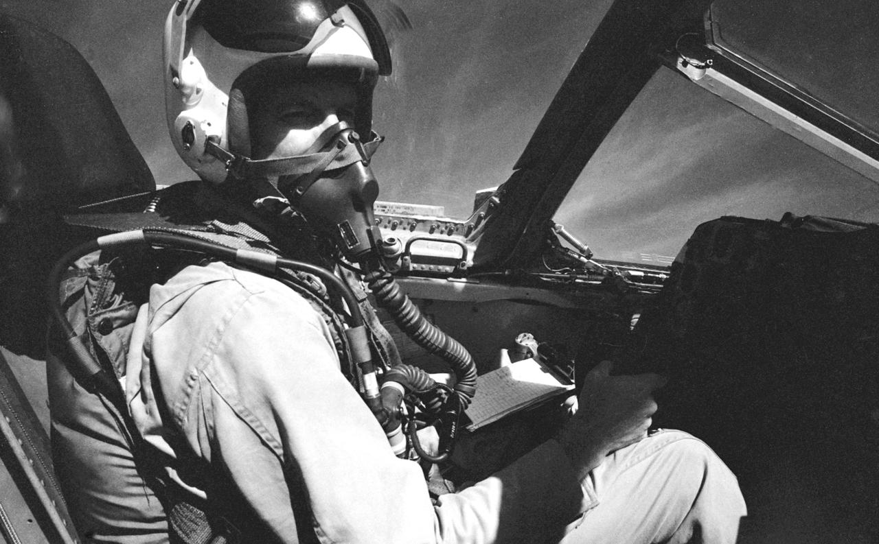 S63-03980 (1963) --- Astronaut L. Gordon Cooper Jr., prime pilot for the Mercury-Atlas 9 (MA-9) mission, in flight in a Convair TF-102 aircraft. Photo credit: NASA