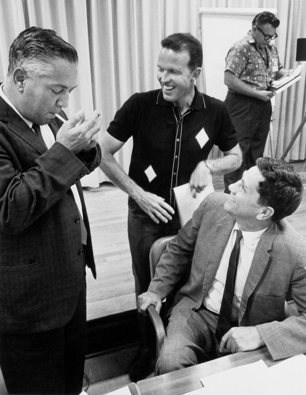 S63-06123 (1963) --- Walter C. Williams, astronaut L. Gordon Cooper Jr., and Merritt Preston are pictured during an Mercury Atlas 9 (MA-9) prelaunch mission review. Photo credit: NASA