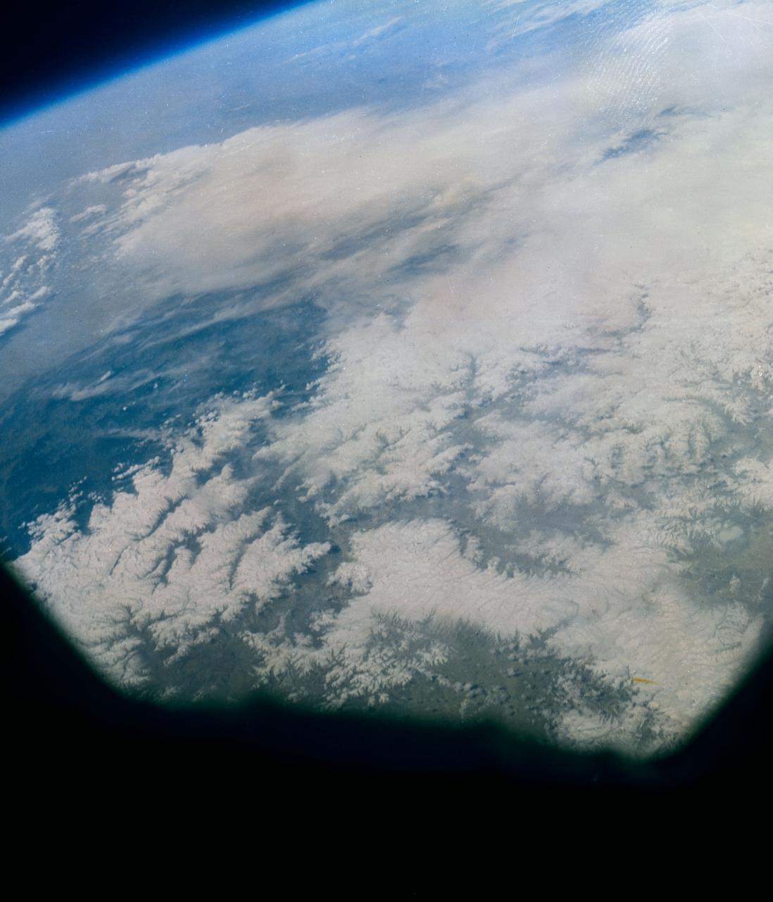 S63-06429 (15-16 May 1963) --- Photograph taken of the eastern Himalayas, Tibet, China, India and Burma from the Mercury-Atlas 9 capsule taken by astronaut L. Gordon Cooper Jr., during his 22-orbit Mercury-Atlas 9 (MA-9) spaceflight. Photo credit: NASA
