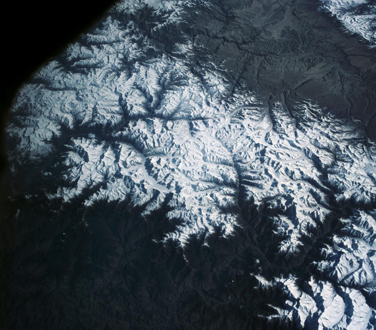 S63-06445 (15-16 May 1963) --- View of the Himalaya Mountain Range in the India-Nepal-Tibet border area, as photographed from the Mercury-Atlas 9 capsule by astronaut L. Gordon Cooper Jr., during his 22-orbit MA-9 spaceflight. Photo credit: NASA