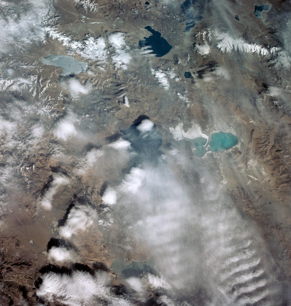S63-06454 (15-16 May 1963) --- Tibetan Lake Country North of Katmandu, west of Ihasa, photographed from the Mercury-Atlas 9 (MA-9) capsule by astronaut L. Gordon Cooper Jr., during his 22-orbit MA-9 spaceflight. Photo credit: NASA