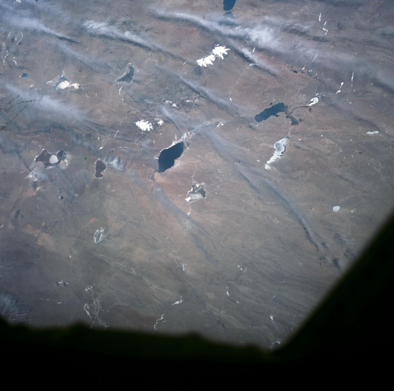 S63-06456 (15-16 May 1963) --- Lakes of Western Tibet, photographed from the Mercury-Atlas 9 (MA-9) capsule by astronaut L. Gordon Cooper Jr., during his 22-orbit MA-9 spaceflight. Photo credit: NASA