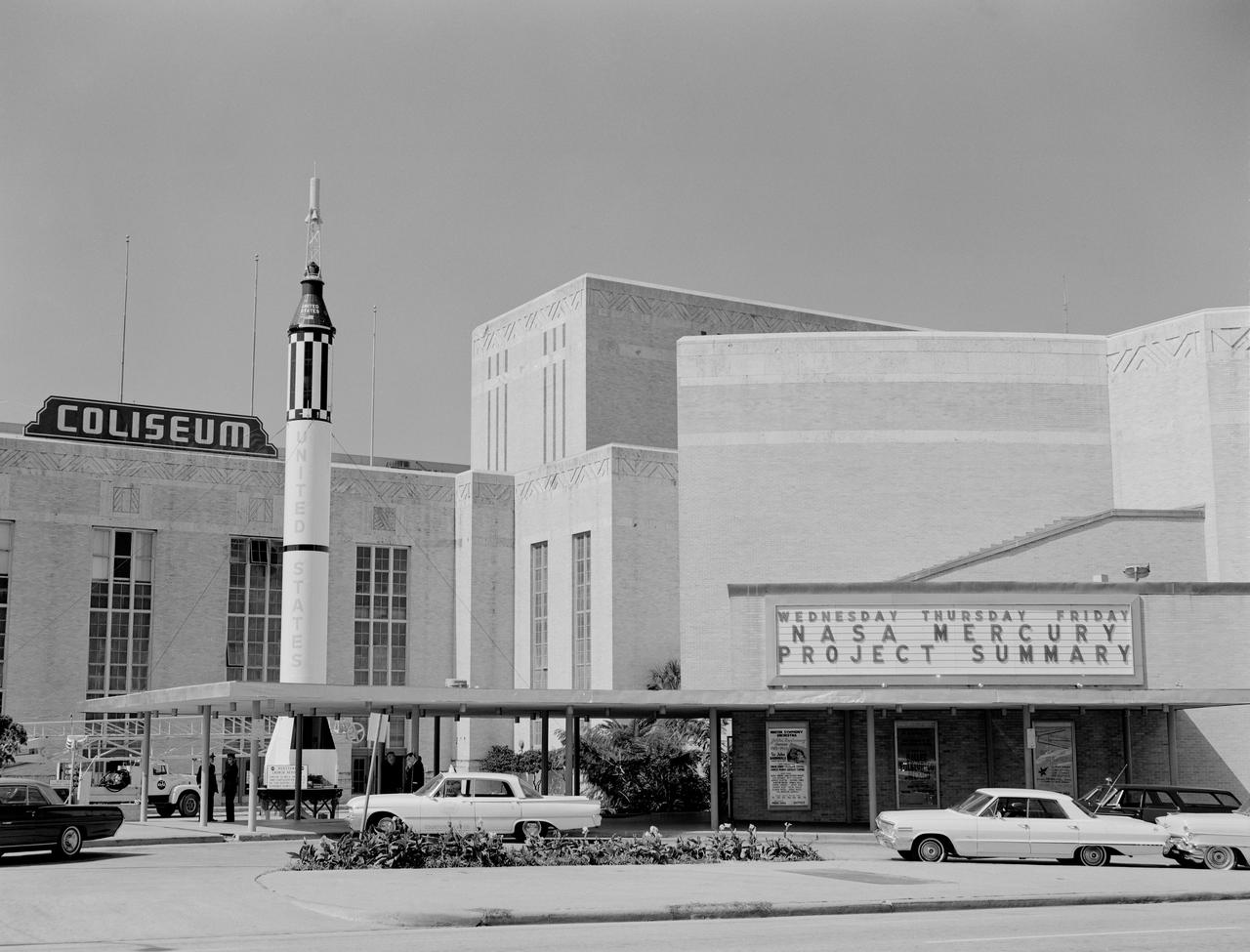 In October 1963, the Project Mercury Summary Conference was held in the Houston, TX, Coliseum. This series of 44 photos is documentation of that conference. A view of the Houston, TX, Coliseum, and parking area in front with a Mercury Redstone Rocket setup in the parking lot for display (S63-16451). A view of an Air Force Atlas Rocket, a Mercury Redstone Rocket, and a Mercury Spacecraft on a test booster on display in the front area of the Coliseum (S63-16452). A view an Air Force Atlas Rocket and a Mercury Redstone Rocket set up for display with the Houston City Hall in the background (S63- 16453). This view shows the Atlas Rocket, Mercury Redstone, and Mercury Test Rocket with the Houston, TX, Coliseum in the background (S63- 16454). A balcony view, from the audience right side, of the attendees looking at the stage (S63-16455). A view of the NASA Space Science Demonstration with equipment setup on a table, center stage and Space Science Specialist briefing the group as he pours Liquid Oxygen into a beaker (S63-16456). View of the audience from the balcony on the audience right showing the speakers lecturn on stage to the audience left (S63-16457). A view of attendees in the lobby. Bennet James, MSC Public Affairs Office is seen to the left of center (S63-16458). Another view of the attendees in the lobby (S63- 16459). In this view, Astronaut Neil Armstrong is seen writing as others look on (S63-16460). In this view of the attendees, Astronauts Buzz Aldrin and Walt Cunningham are seen in the center of the shot. The October Calendar of Events is visable in the background (S63-16461). Dr. Charles Berry is seen in this view to the right of center, seated in the audience (S63-16462). View of " Special Registration " and the five ladies working there (S63-16463). A view from behind the special registration table, of the attendees being registered (S63-16464). A view of a conference table with a panel seated. (R-L): Dr. Robert R. Gilruth, Hugh L. Dryden, Walter C. Williams, and an unidentified man (S63- 16465). A closeup of the panel at the table with Dr. Gilruth on the left (S63-16466). About the same shot as number S63-16462, Dr. Berry is seen in this shot as well (S63-16467). In this view the audio setup is seen. In the audience, (L-R): C. C. Kraft, Vernon E. (Buddy) Powell, Public Affairs Office (PAO); and, in the foreground mixing the audio is Art Tantillo; and, at the recorder is Doyle Hodges both of the audio people are contractors that work for PAO at MSC (S63-16468). In this view Maxime Faget is seen speaking at the lecturn (S63-16469). Unidentified person at the lecturn (S63-16470). In this view the motion picture cameras and personel are shown documenting the conference (S63-16471). A motion picture cameraman in the balcony is shown filming the audience during a break (S63- 16472). Family members enjoy an exhibit (S63-16473). A young person gets a boost to look in a Gemini Capsule on display (S63-16474). A young person looks at the Gemini Capsule on display (S63-16475). Dr. Robert R. Gilruth is seen at the conference table (S63-16476). Walt Williams is seen in this view at the conference table (S63-16477). Unidentified man sitting next to Walt Williams (S63-16478). (L-R): Seated at the conference table, Dr. Robert Gilruth, Hugh L. Dryden, and Walt Williams (S63- 16479). Group in lobby faces visable, (L-R): Walt Williams, unidentified person, Dr. Robert Gilruth, Congressman (S63-16480). Man in uniform at the lecturn (S63-16481). Astronaut Leroy Gordon Cooper at the lecturn (S63-16482). Astronaut Cooper at the lecturn with a picture on the screen with the title, " Astronaut Names for Spacecraft " (S63-16483). Dr. Gilruth at the lecturn (S63-16484). Walt Williams at the lecturn (S63-16485). Unidentified man at the lecturn (S63-16486). John H. Boynton addresses the Summary Conference (S63-16487). (L-R): Astronaut Leroy Gordon Cooper, Mrs. Cooper, Senator Cris Cole, and Mrs. Cole (S63- 16488). In this view in the lobby, Senator and Mrs. Cris Cole, with Astronaut Gordon Cooper standing near the heatshield, and Mrs. Cooper; next, on the right is a press photographer (S63-16489). (L-R): Astronaut L. Gordon Cooper and Mrs. Cooper, unidentified man, and Senator Walter Richter (S63-16490). (L-R): Eugene Horton, partially obscured, briefs a group on the Mercury Spacecraft, an unidentified person, Harold Ogden, a female senator, Senator Chris Cole, Mrs. Cole, an unidentified female, Senator Walter Richter, Jim Bower, and an unidentified female (S63-16491). In this view, Mrs. Jim Bates is seen in the center, and Senator Walter Richter to the right (S63- 16492). The next three (3) shots are 4X5 CN (S63-16493 - S63-16495). In this view a NASA Space Science Demonstration is seen (S63-16493). In this view a shot of the conference table is seen, and, (L-R): Dr. Robert R. Gilruth, Hugh L. Dryden, Mr. Walter Williams, and an unidentfied man (S63-16494 - S63-16495). HOUSTON, TX