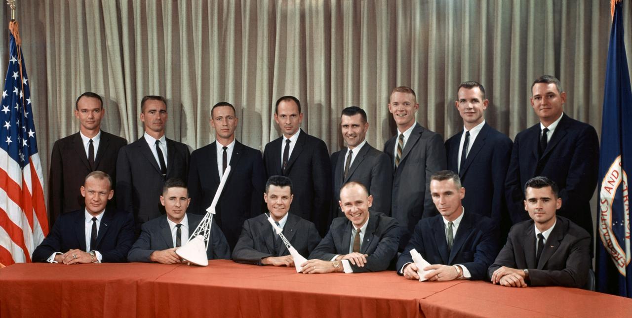 S63-18765 (October 1963) --- These fourteen pilots have been assigned to begin training for astronaut positions with the National Aeronautics and Space Administration (NASA).  Front row, from the left, Edwin E. Aldrin Jr., William A. Anders, Charles A. Bassett II, Alan L. Bean, Eugene A. Cernan and Roger B. Chaffee. Back row, from the left, Michael Collins, Walter Cunningham, Donn F. Eisele, Theodore C. Freeman, Richard F. Gordon Jr., Russell L. Scweickart, David R. Scott and Clifton C. Williams Jr. Photo credit: NASA or National Aeronautics and Space Administration