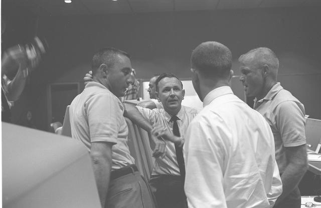 NASA image: Astronauts Grissom and Glenn hold discussion in Mercury Control Center