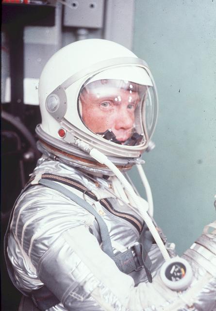 S64-36910 (February 1962) --- Astronaut John H. Glenn Jr., wearing a Mercury pressure suit, was the pilot of the Mercury-Atlas 6 (MA-6) mission. Glenn made America's first manned Earth-orbiting spaceflight on Feb. 20, 1962.  This photograph was taken at Cape Canaveral, Florida, during MA-6 preflight training activities. Photo credit: NASA