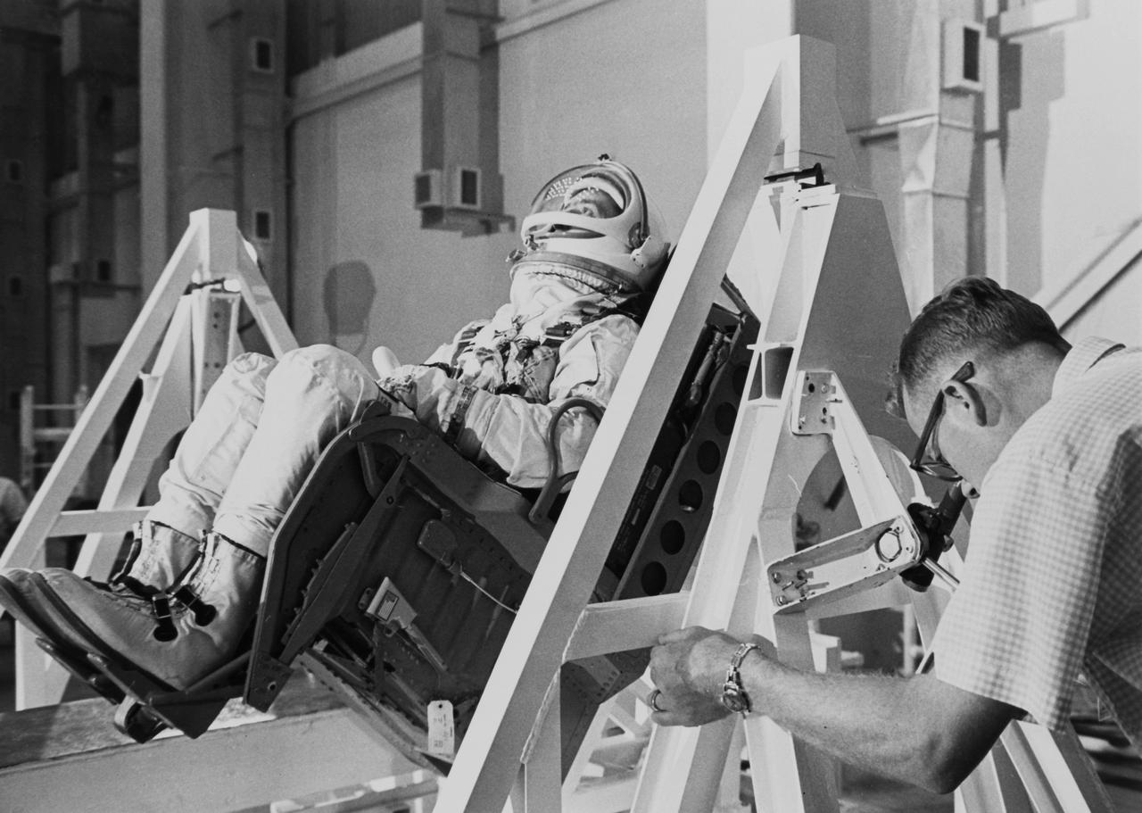 S65-19585 (21 May 1965) --- Astronaut James A. McDivitt, command pilot for the Gemini-Titan 4 prime crew, participates in a weight and balance test during a wet mock simulation exercise at Cape Kennedy, Florida. The two-man Gemini-4 mission, scheduled no earlier than June 3, 1965, will orbit Earth 62 times in four days. Astronaut Edward H. White II (out of frame) is the GT-4 prime crew pilot.