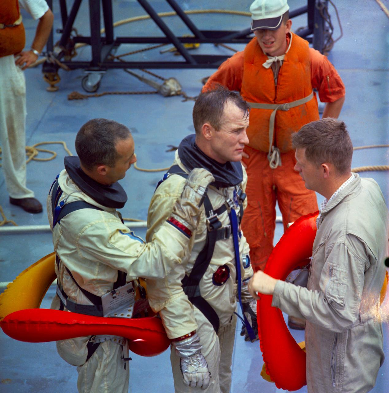 S65-22655 (14 April 1965) --- The Gemini-Titan 4 prime crew is shown aboard the NASA Motor Vessel Retriever in the Gulf of Mexico suiting up for water egress training. Astronaut James A. McDivitt (left) is the command pilot, and astronaut Edward H. White II is the pilot.