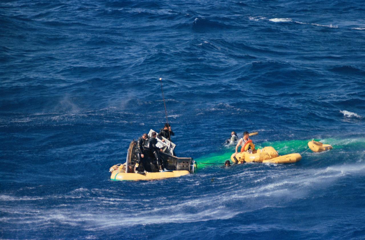 S65-22893 (23 March 1965) --- Astronaut John W. Young, the pilot of the Gemini-Titan III (GT-3) flight, waits in a life raft to be picked up by a helicopter during recovery operations following the successful three-orbit mission. Young and astronaut Virgil I. Grissom, command pilot, were flown by helicopter to the nearby recovery vessel, the USS Intrepid. The recovery ship later came alongside and retrieved the GT-3 spacecraft.  United States Navy swimmers assisted in the GT-3 recovery operations.