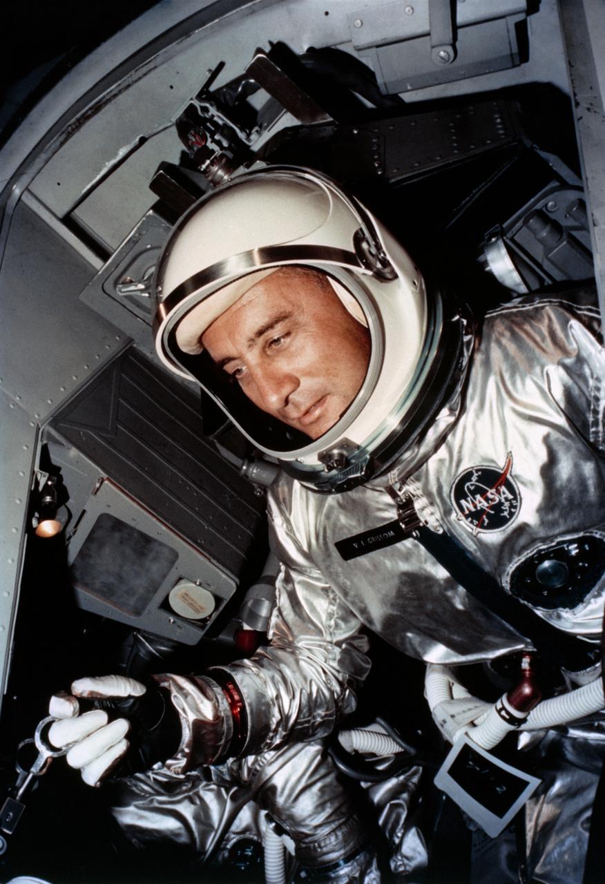 S65-23489 (23 March 1965) --- Astronaut Virgil I. Grissom, the command pilot of the Gemini-Titan 3 (GT-3) space flight, is shown in the GT-3 spacecraft just before the hatches are secured prior to launch. Grissom and his pilot, astronaut John W. Young, made three orbits of Earth during the GT-3 mission, in four hours and 53 minutes.
