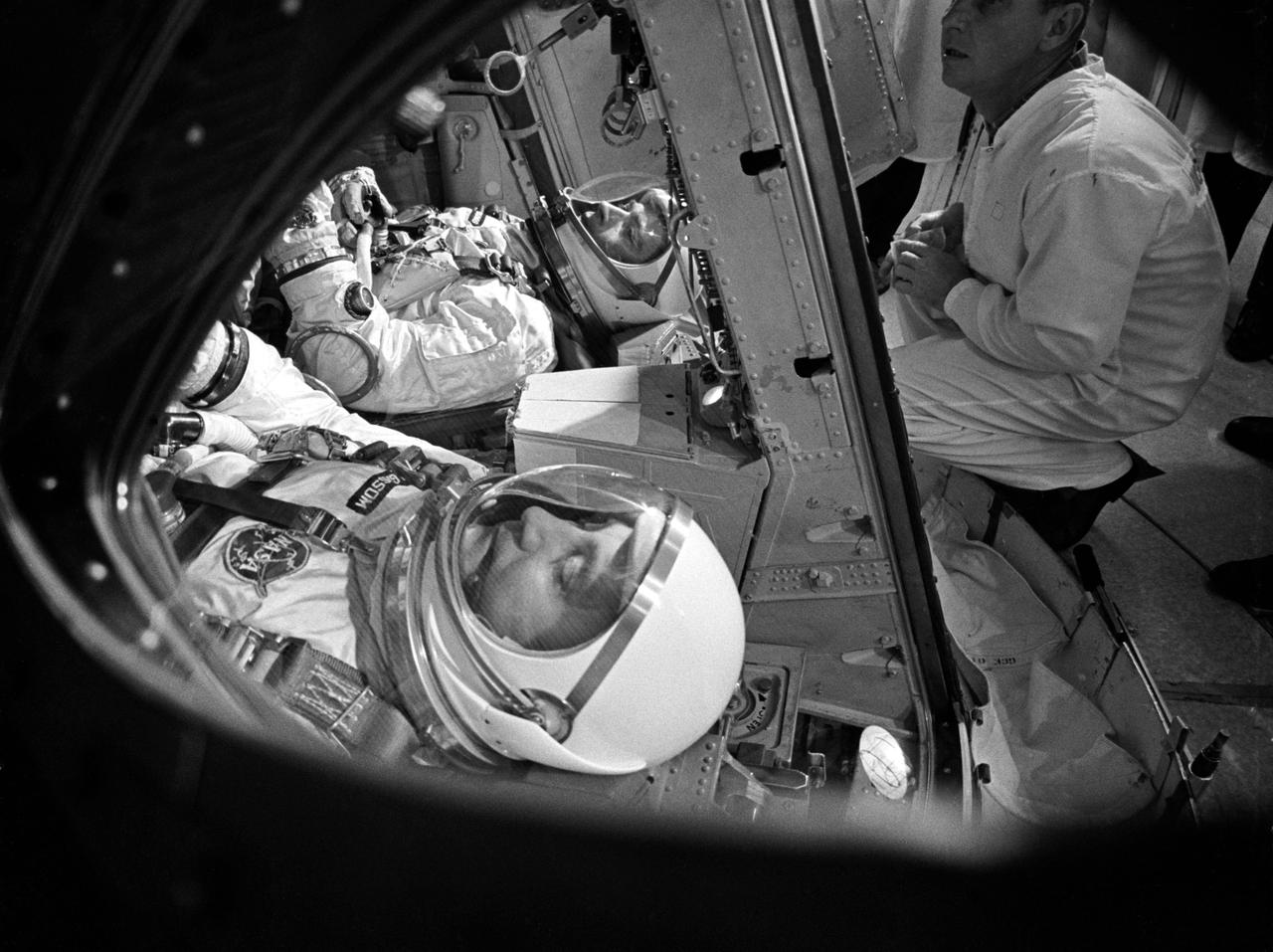 Final preparation for insertion of the crew members into the GT-III Spacecraft takes place in the white room atop the Launch Vehicle, Pad 19.            CAPE KENNEDY, FL                 B&W