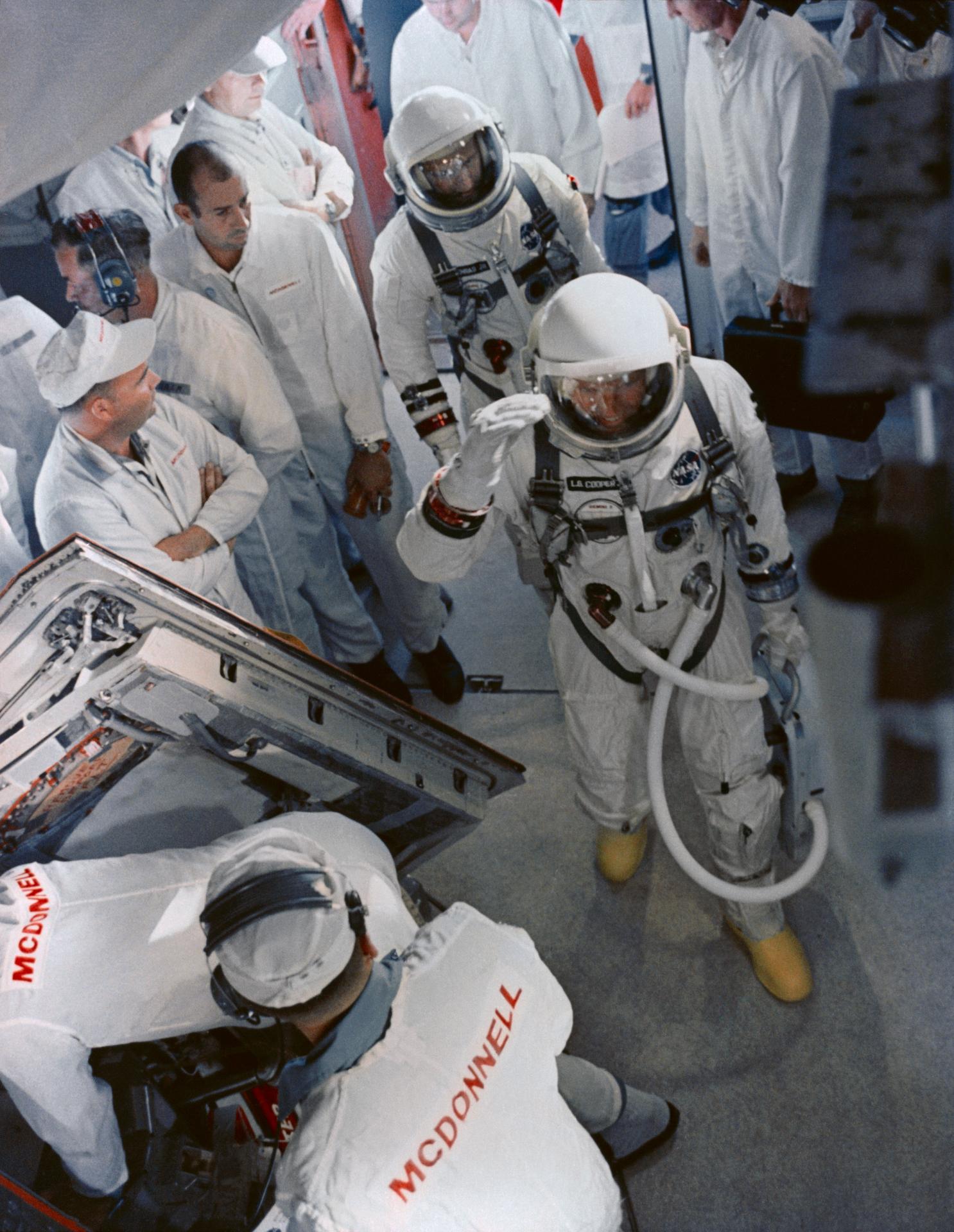 Gordon Cooper arrives at the White Room for the Gemini 5 mission