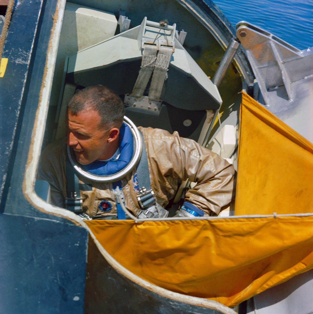 S65-39935 (21 July 1965) --- Astronaut L. Gordon Cooper Jr., command pilot of the Gemini-5 spaceflight, is pictured during water egress training in the Gulf of Mexico.