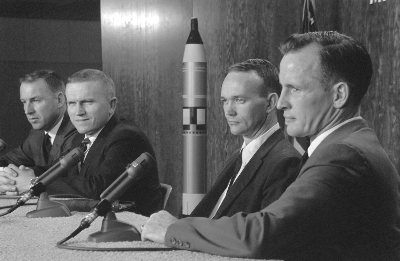 S65-57987 (1 Nov. 1965) --- The prime and backup crews of Gemini-7 spaceflight, scheduled for early December 1965, met with members of various news media at the MSC News Center. Left to right, are astronauts James A. Lovell Jr., prime crew pilot; Frank Borman, prime crew command pilot; Michael Collins, backup crew pilot; and Edward H. White II, backup crew command pilot. Photo credit: NASA
