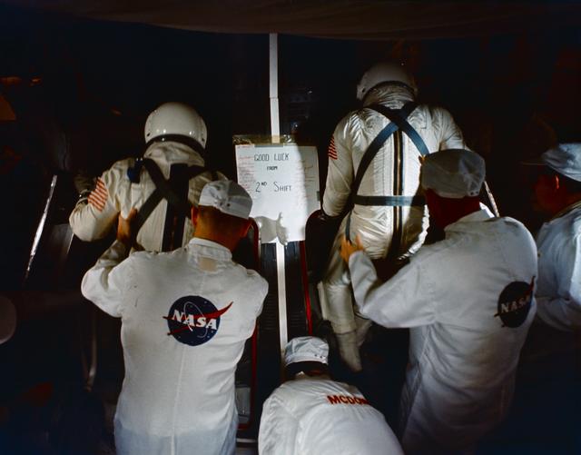 NASA image: GEMINI-TITAN (GT)-6 - PREFLIGHT ACTIVITY (INSERTION)(PRIME CREW) -  ASTRONAUT WALTER M. SCHIRRA, JR. - MISC. - CAPE