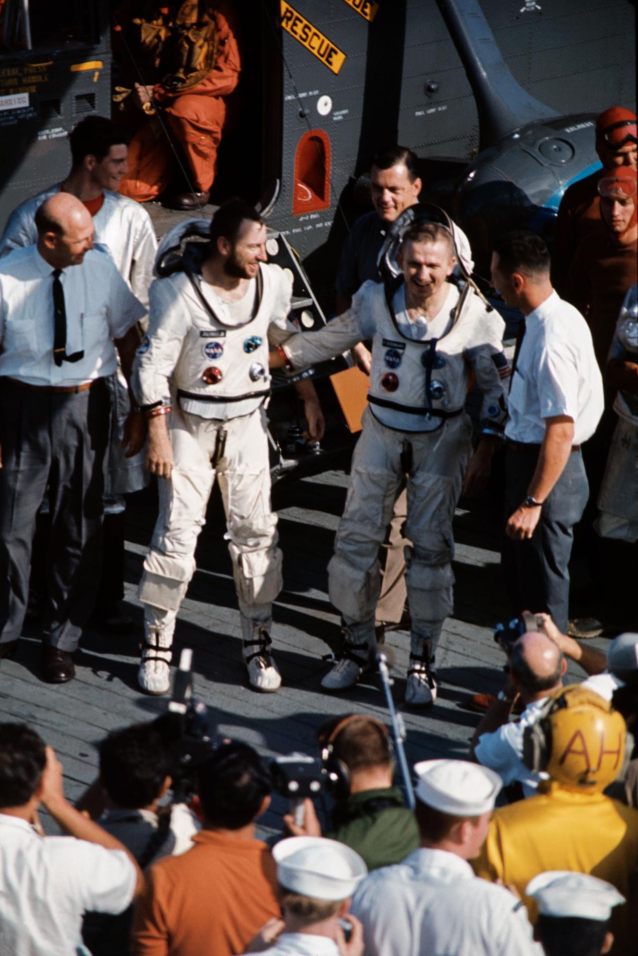 The Gemini 7 astronauts are greeted on the USS Wasp aircraft carrier