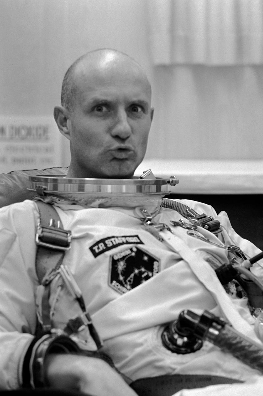 S65-61913 (12 Dec. 1965) --- Astronaut Thomas P. Stafford, pilot, makes a facial gesture at the camera while suiting up in Launch Complex 16 trailer during Gemini-6 prelaunch countdown. NASA has planned a two-day mission in space for astronauts Stafford and Walter M. Schirra Jr. (out of frame), command pilot. An attempt was made to launch Gemini-6 from Pad 19 at 9:54 a.m. (EST) on Dec. 12, 1965. However, seconds after ignition, the first stage engine of the Gemini-6 launch vehicle shutdown due to a faulty release of a liftoff umbilical plug. Photo credit: NASA or National Aeronautics and Space Administration