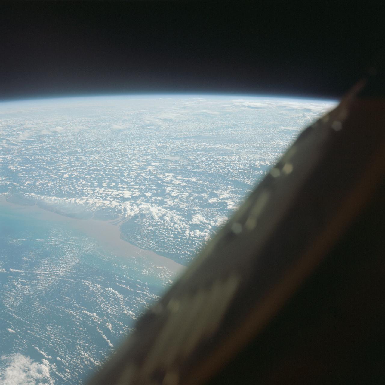 S65-64029 (13 Dec. 1965) --- Coast of British Guiana, South America, looking south, as seen from the National Aeronautics and Space Administration?s Gemini-7 spacecraft during its 135th revolution of Earth. This photograph was taken with a modified 70mm Hasselblad camera, using Eastman Kodak, Ektachrome MS (S.O. 217) color film. Photo credit: NASA