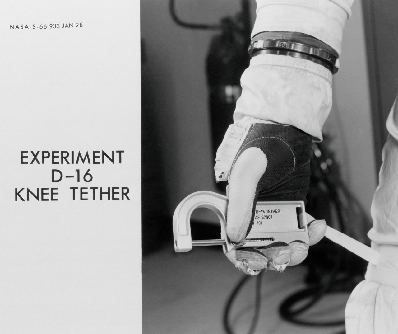 S66-00933 (28 Jan. 1966) --- Gemini-11 Experiment D-16 Knee Tether, sponsored by the Department of Defense and the United States Air Force. The astronaut tightens and loosens bolts in a prescribed pattern during his extravehicular activity, once with his body held to the spacecraft by a nine-inch tether looped around his knee and through the handrail, and once without the tether. Photo credit: NASA