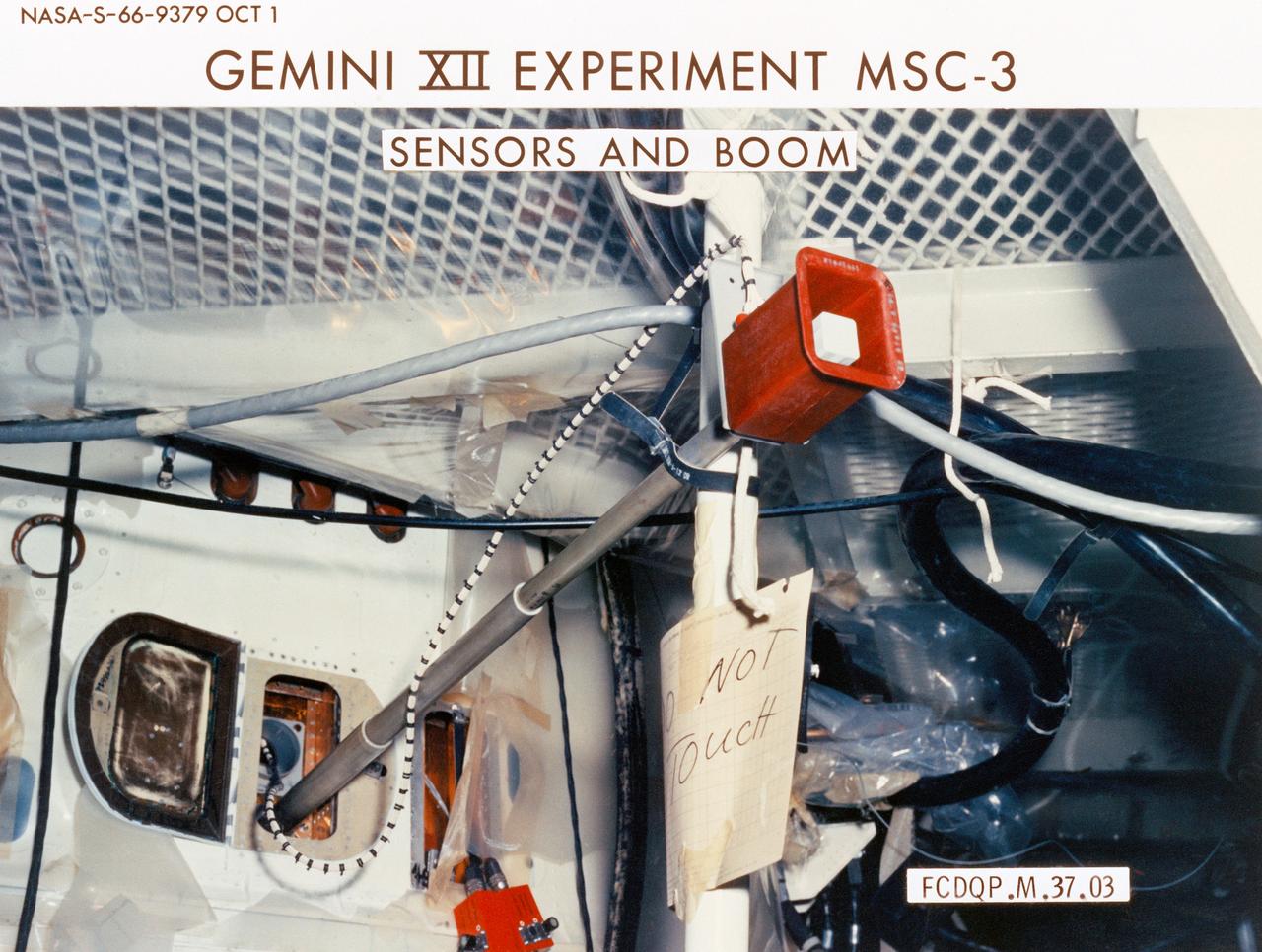 S66-09379 (1 Oct. 1966) --- Tri-Axis Magnetometer-Sensor Unit mounted on telescoping boom. Cable connects Sensor Unit with Electronics Unit mounted on retrograde beam in retrograde adapter section. Objective of experiment is to monitor the direction and amplitude of Earth's magnetic field (Gemini-12). Photo credit: NASA