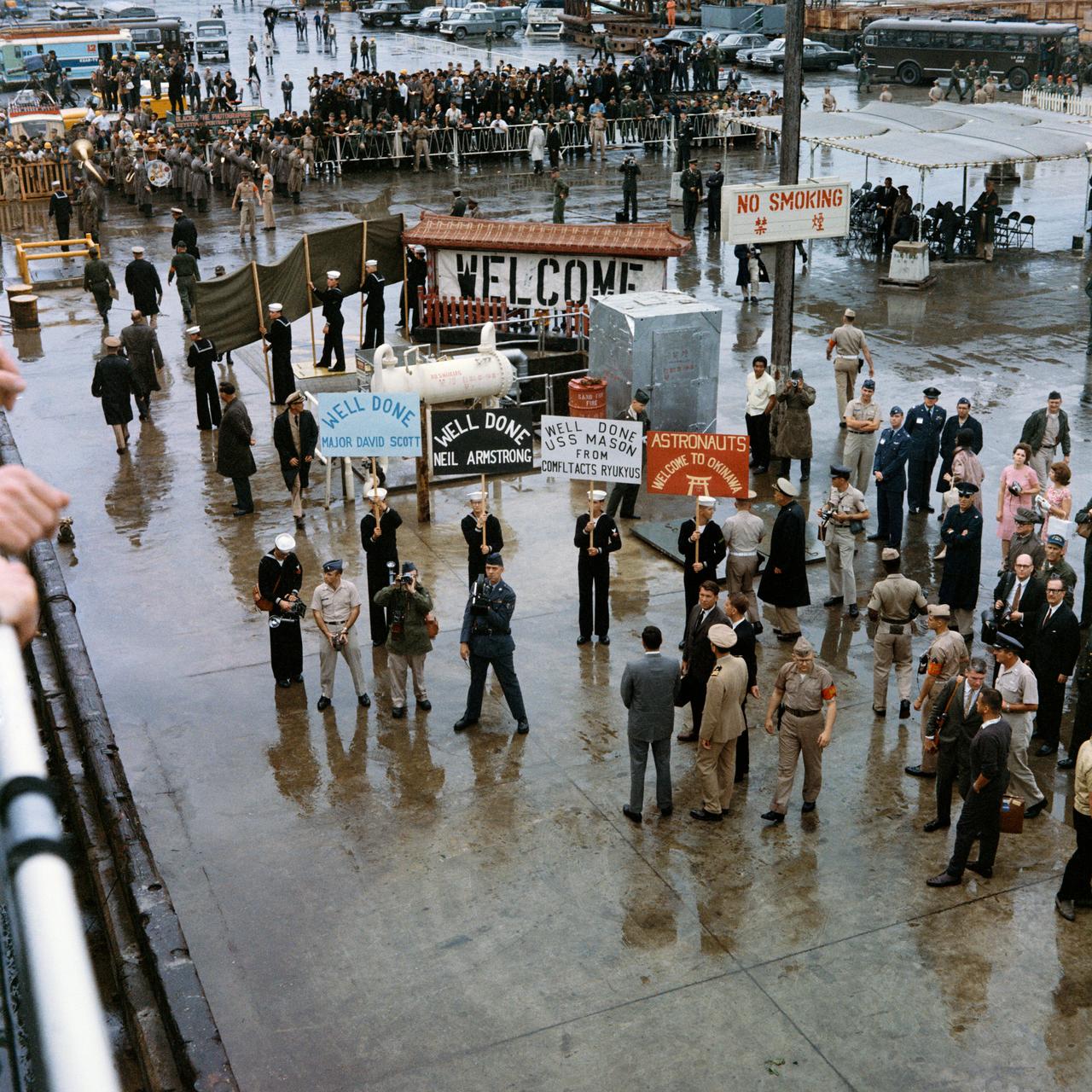 S66-18606 (17 March 1966) --- U.S. personnel at the Naha, Okinawa, military installation plan a welcome for the Gemini-8 crew. Photo credit: NASA