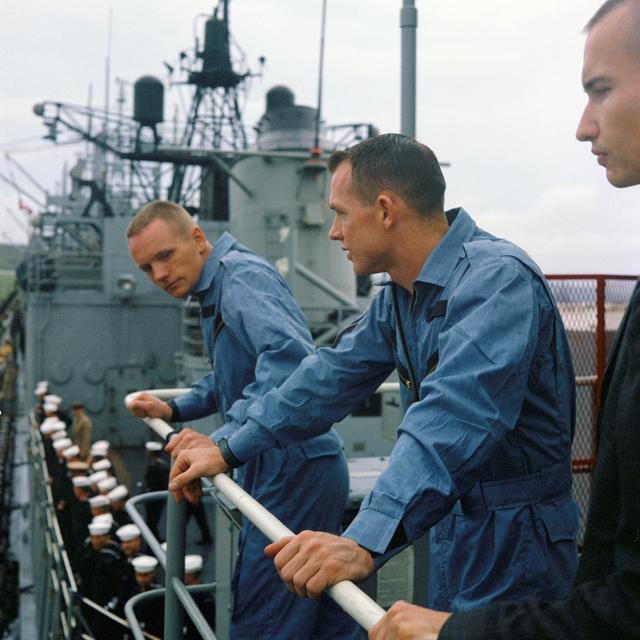 NASA image: Gemini 8 crew stands on deck of recovery vessel