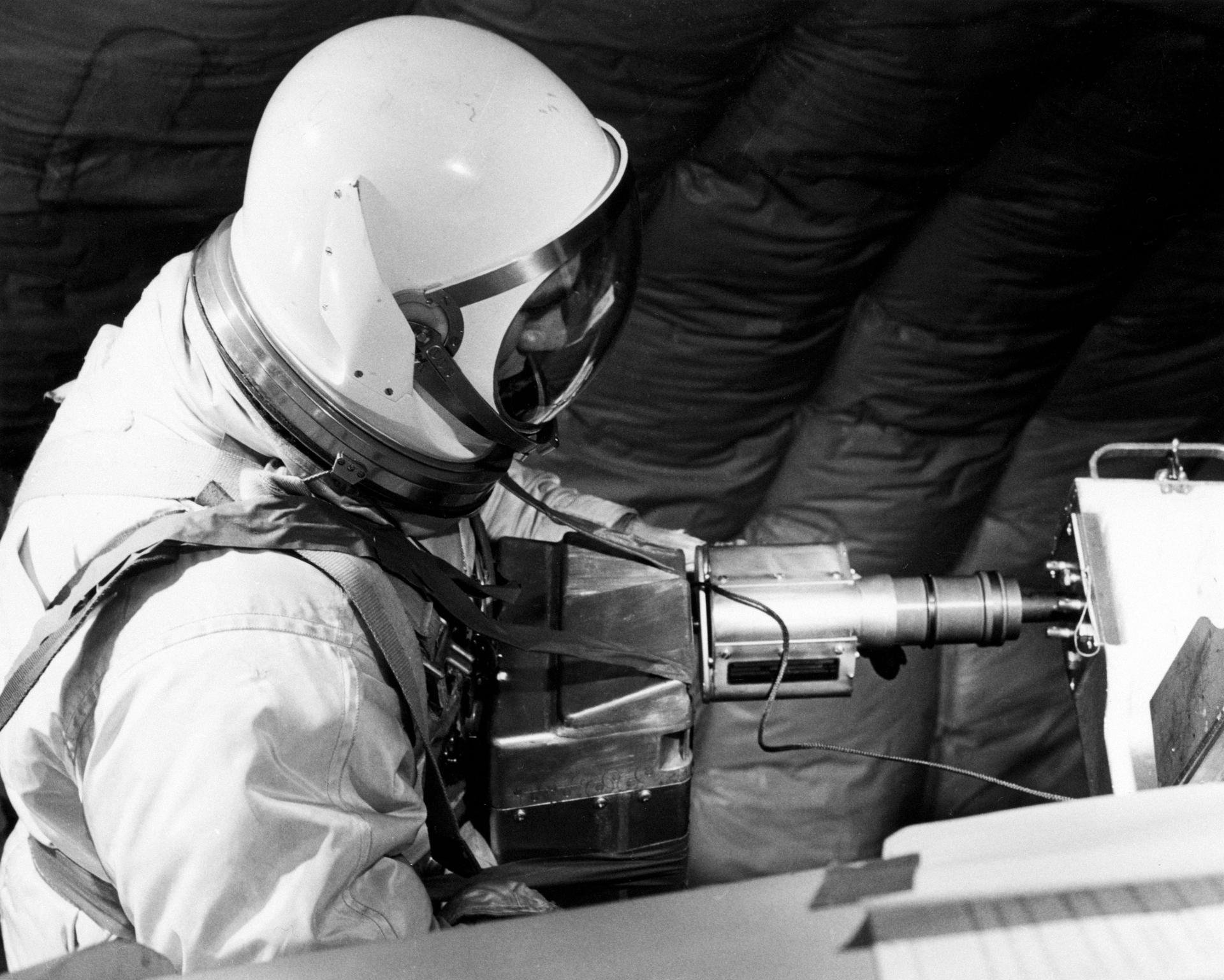 David Scott doing EVA training on a parabolic flight