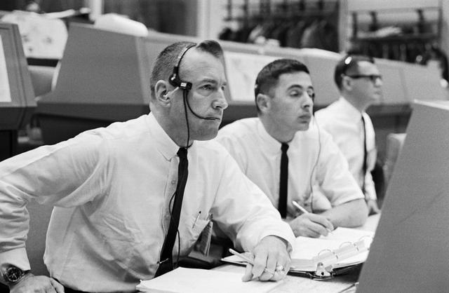 NASA image: Gemini 8 spacecraft communicators James A. Lovell Jr and William A. Anders in the MCC
