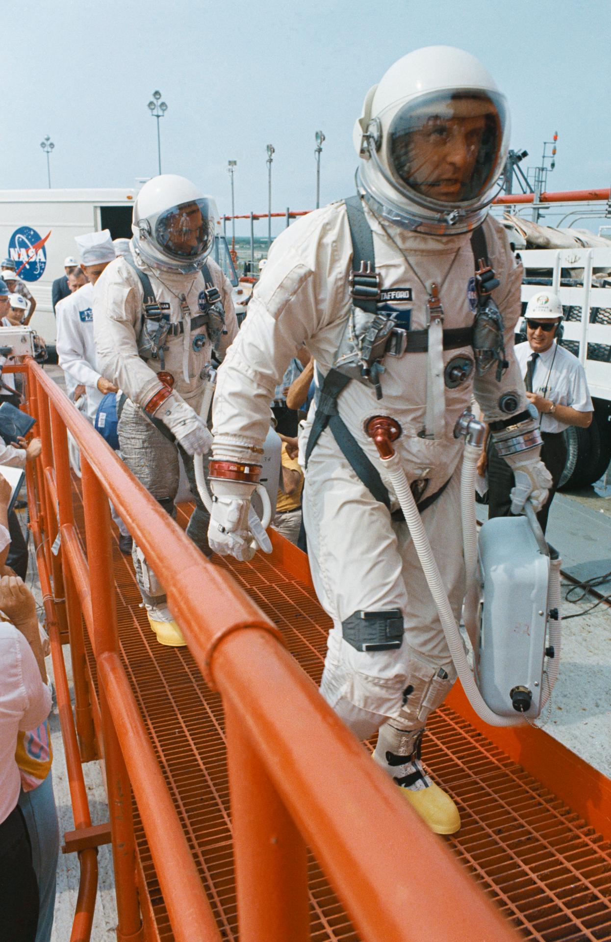 Astronauts Tom Stafford and Gene Cernan walk up the ramp to board their Gemini9A spacecraft for a prelaunch countdown