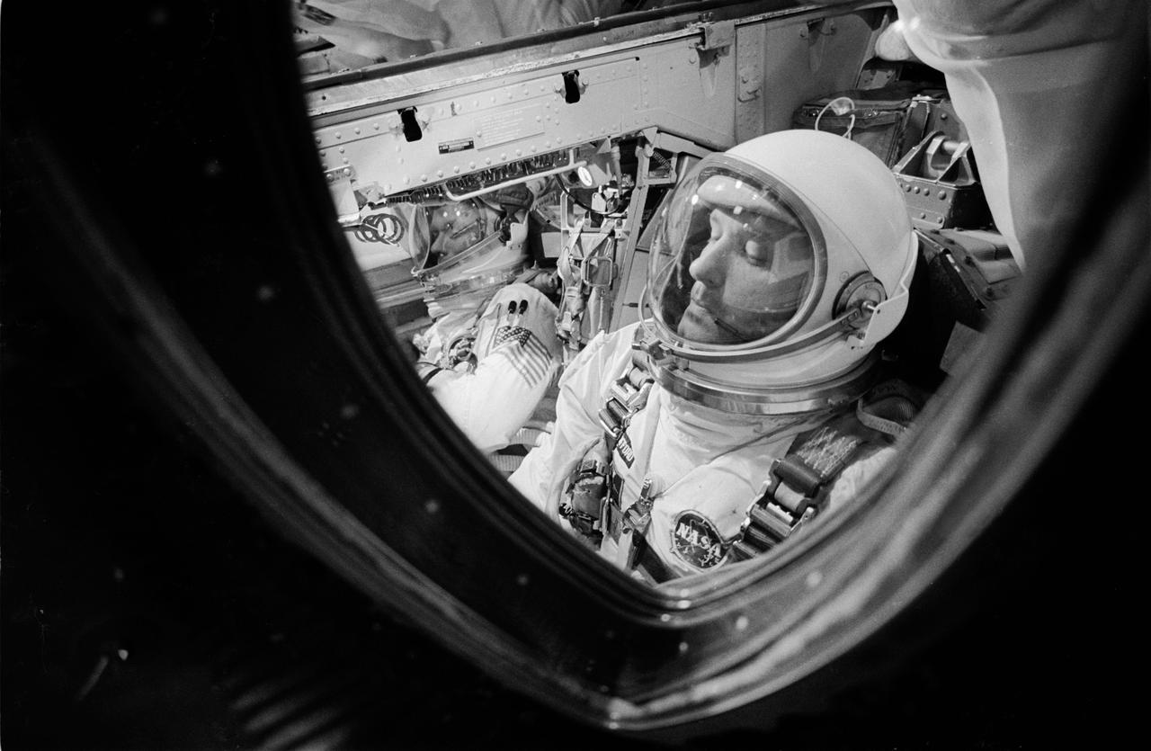 S66-34057 (3 June 1966) --- Fisheye view of astronauts Thomas P. Stafford and Eugene A. Cernan in the Gemini-9 spacecraft while hatches are sealed. They are in the White Room atop Pad 19 at the Kennedy Space Center. Photo credit: NASA