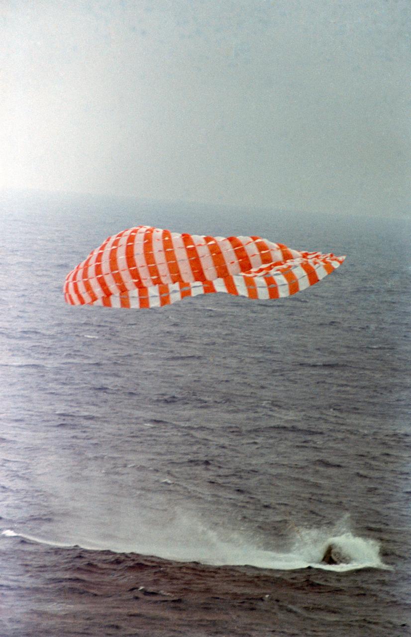 S66-34117 (6 June 1966) --- The 72-hour, 21-minute Gemini-9A spaceflight is concluded as the Gemini spacecraft, with astronaut Thomas P. Stafford and Eugene A. Cernan aboard, touches down in the Atlantic Ocean only 3.5 miles from the prime recovery ship, the aircraft carrier USS Wasp. Gemini-9 splashed down 345 miles east of Cape Kennedy at 9 a.m. (EST), June 6, 1966. Photo credit: NASA