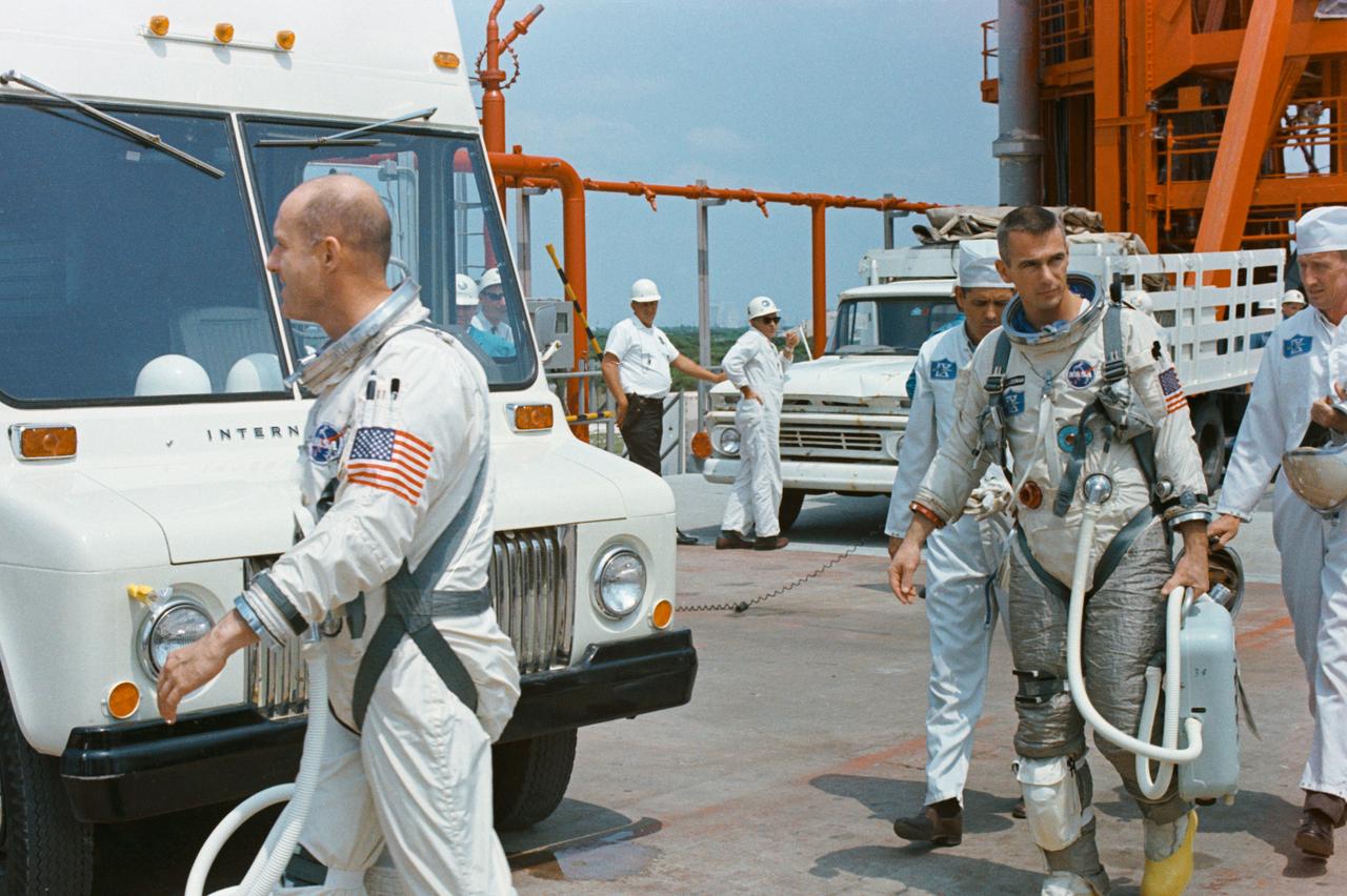 S66-34559 (17 May 1966) --- Astronauts Thomas P. Stafford (left), command pilot, and Eugene A. Cernan, pilot, walk away from Pad 19 after the Gemini-9 mission was postponed. Failure of the Agena Target Vehicle to achieve orbit caused the postponement of the mission. Photo credit: NASA