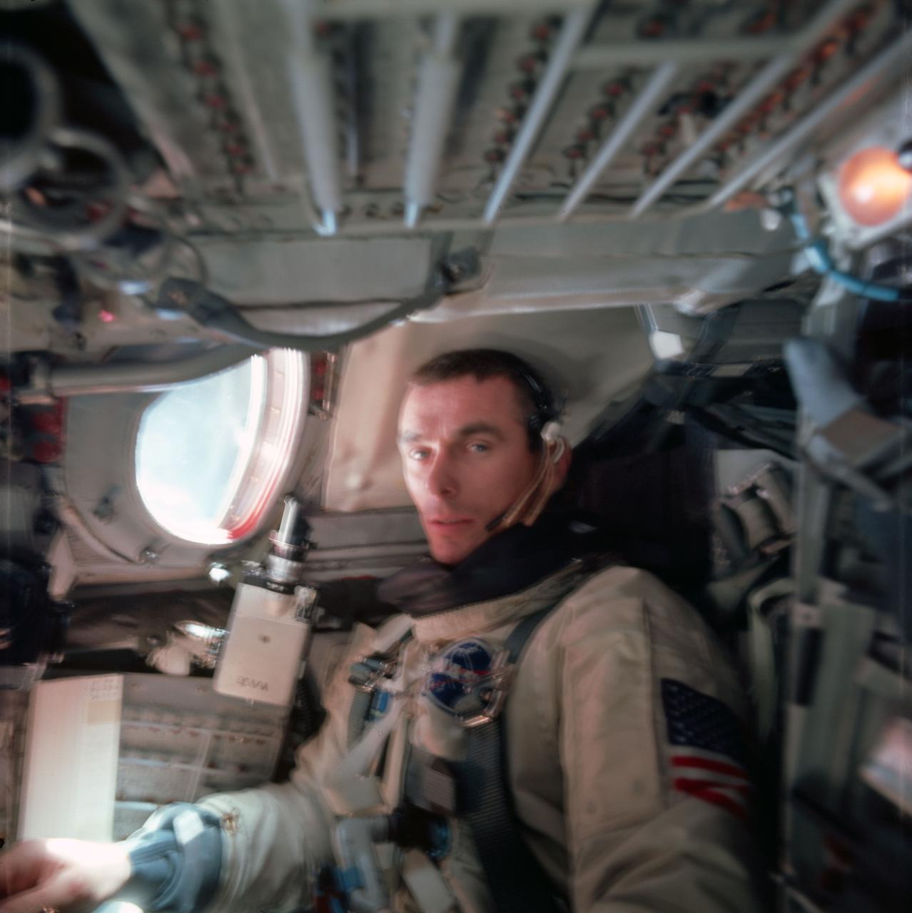 S66-38082 (3 June 1966) --- Astronaut Eugene A. Cernan, pilot of the Gemini-9A spaceflight, is photographed inside the spacecraft by the command pilot, astronaut Thomas P. Stafford during the flight. Photo credit: NASA