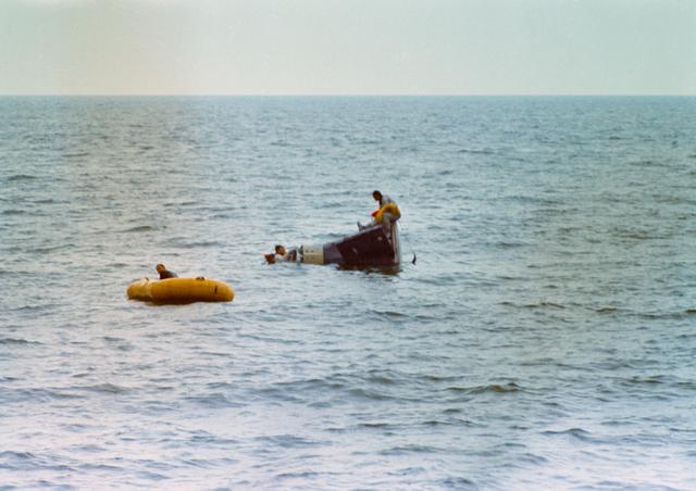 Astronauts Young and Collins during water egress training