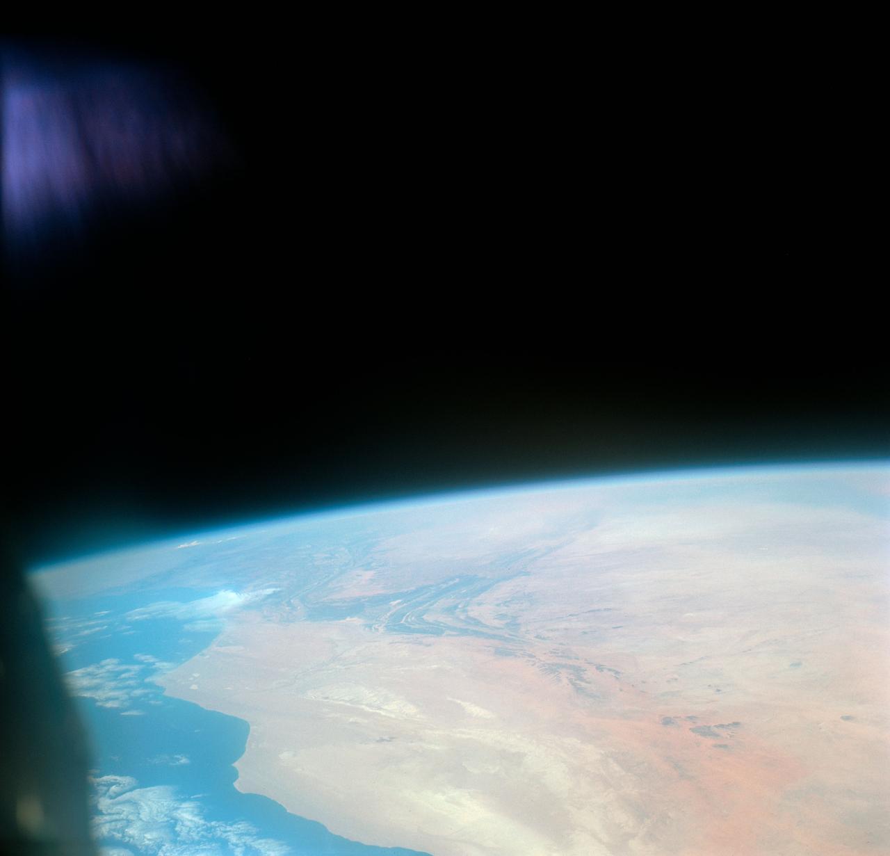 S66-46062 (18-21 July 1966) --- Area of the Spanish Sahara--Mauritania--Algeria--Morocco, looking north into Hamada Du Dra, as seen from the Gemini-10 spacecraft. Taken with a J.A. Maurer 70mm camera, using Eastman Kodak, Ektachrome, MS (S.O. 217) color film. Photo credit: NASA