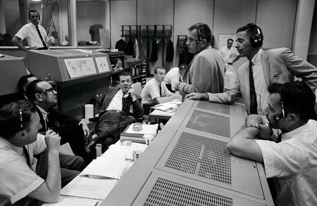 NASA image: Personnel discussing Gemini 11 space flight in Mission Control