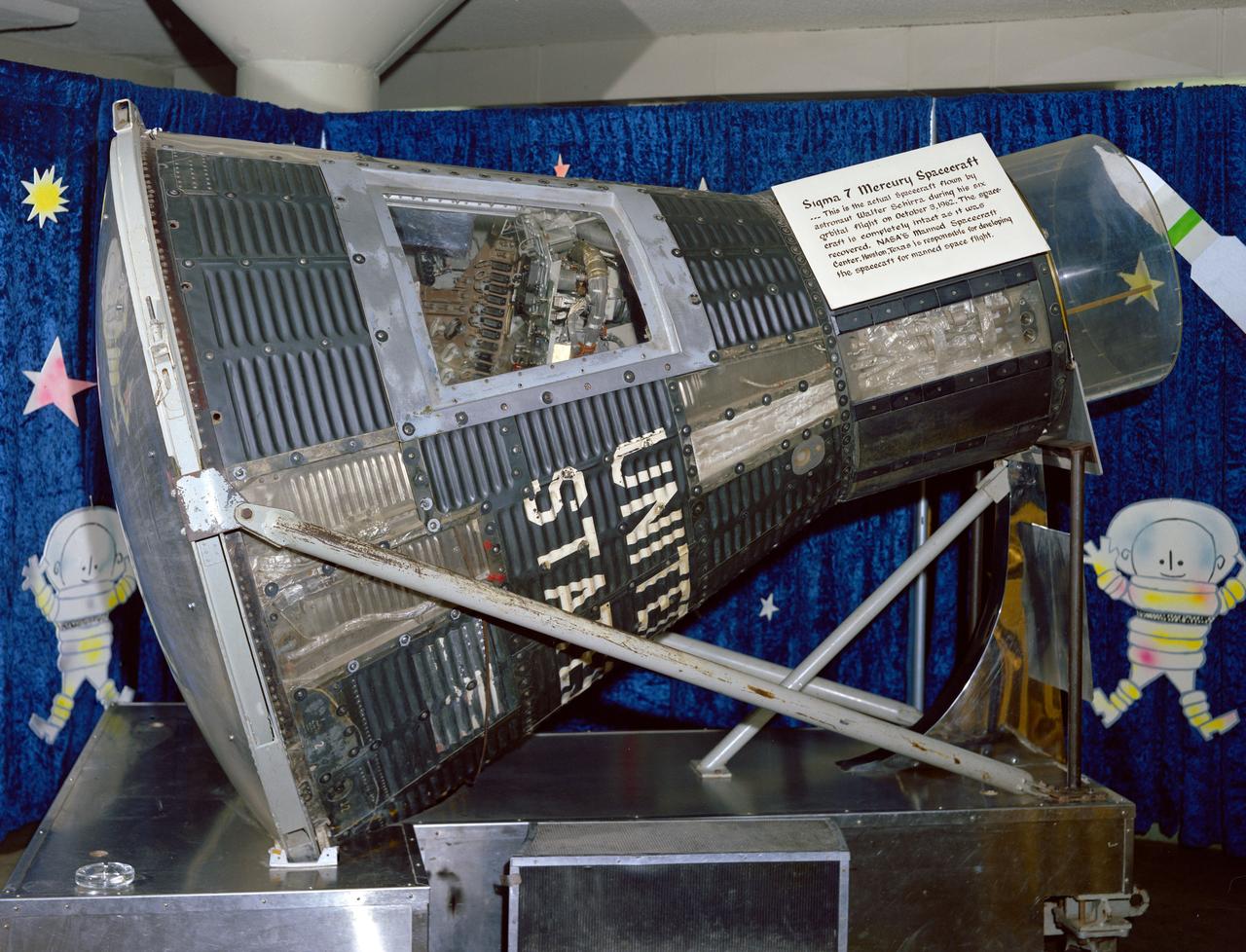 S66-53205 (1966) --- Mercury Atlas (MA-8) Sigma 7 capsule on display at the Johnson Space Center. Photo credit: NASA