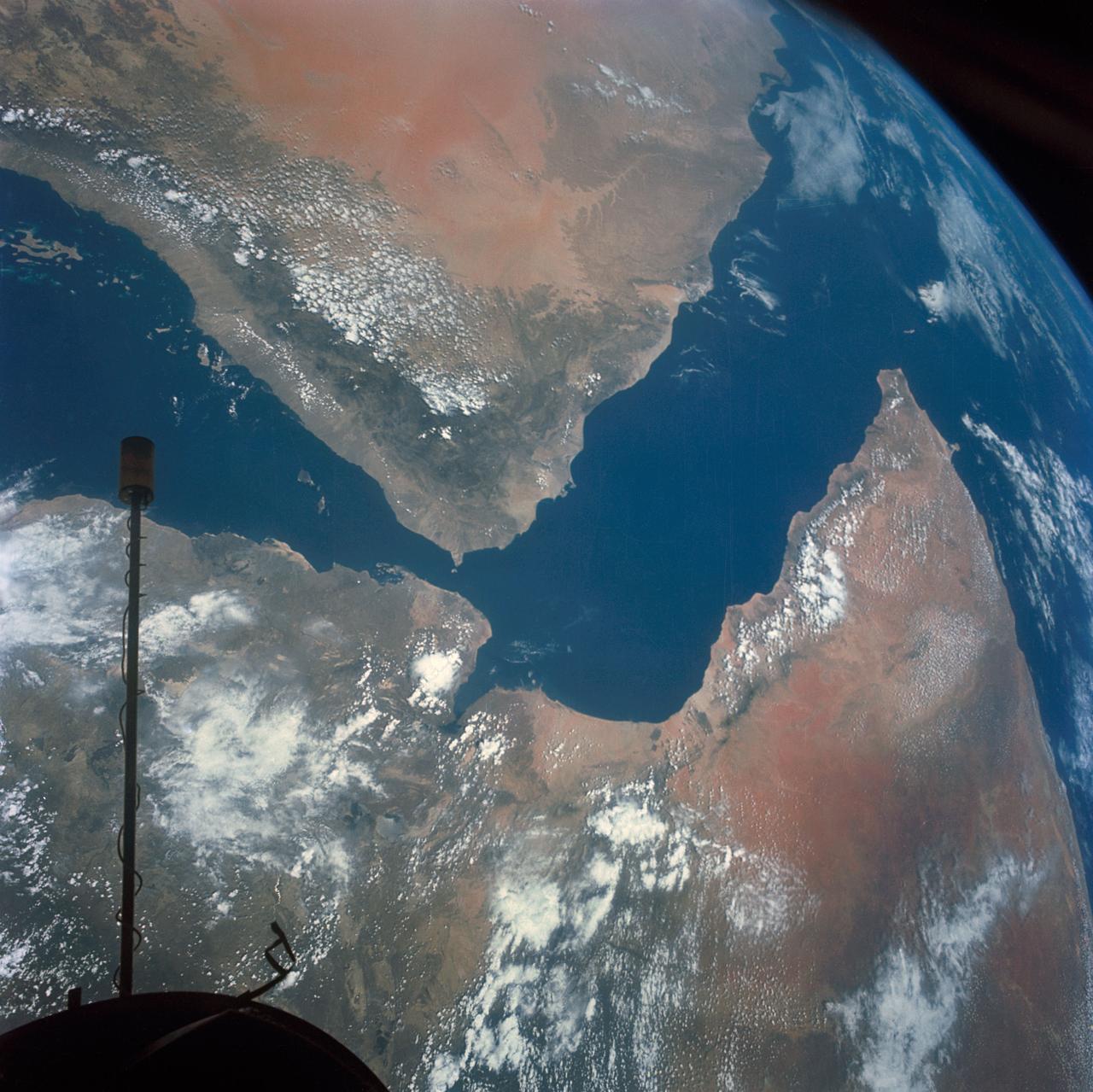 S66-54536 (14 Sept. 1966) --- Arabian Peninsula (on left) and northeast Africa (on right) as seen from the orbiting Gemini-11 spacecraft at an altitude of 340 nautical miles during its 27th revolution of Earth, looking southeast. Saudi Arabia, South Arabia, Yemen, and Aden Protectorate are at left. At bottom right is Ethiopia. French Somaliland is in center on right shore. Somali is at upper right. Body of water at bottom is Red Sea. Gulf of Aden is in center; and at top left is Indian Ocean. Taken with a modified 70mm Hasselblad camera, using Eastman Kodak, Ektachrome, MS (S.O. 368) color film. Photo credit: NASA