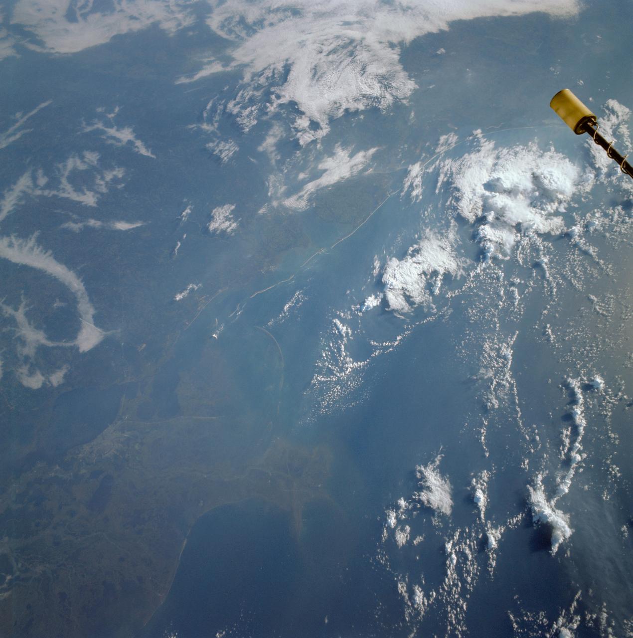 S66-54563 (14 Sept. 1966) --- View of the Gulf Coast area from Atchafalaya Bay to Apalachicola, including the mouth of the Mississippi River, Mobile Bay, New Orleans, Louisiana, and Pensacola, Florida, as seen from the Gemini-11 spacecraft during its 29th revolution of Earth. This photo was taken near sunrise. Photo credit: NASA