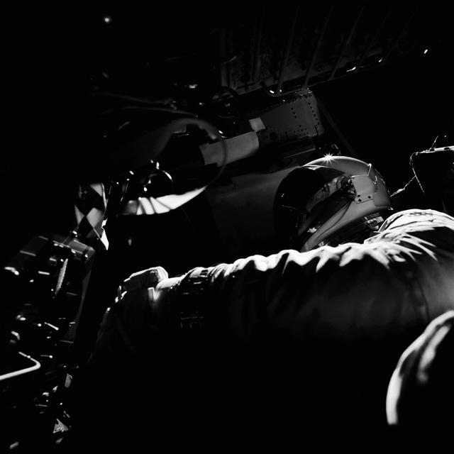 NASA image: Astronaut Richard Gordon prepares to open hatch to jettison equipment