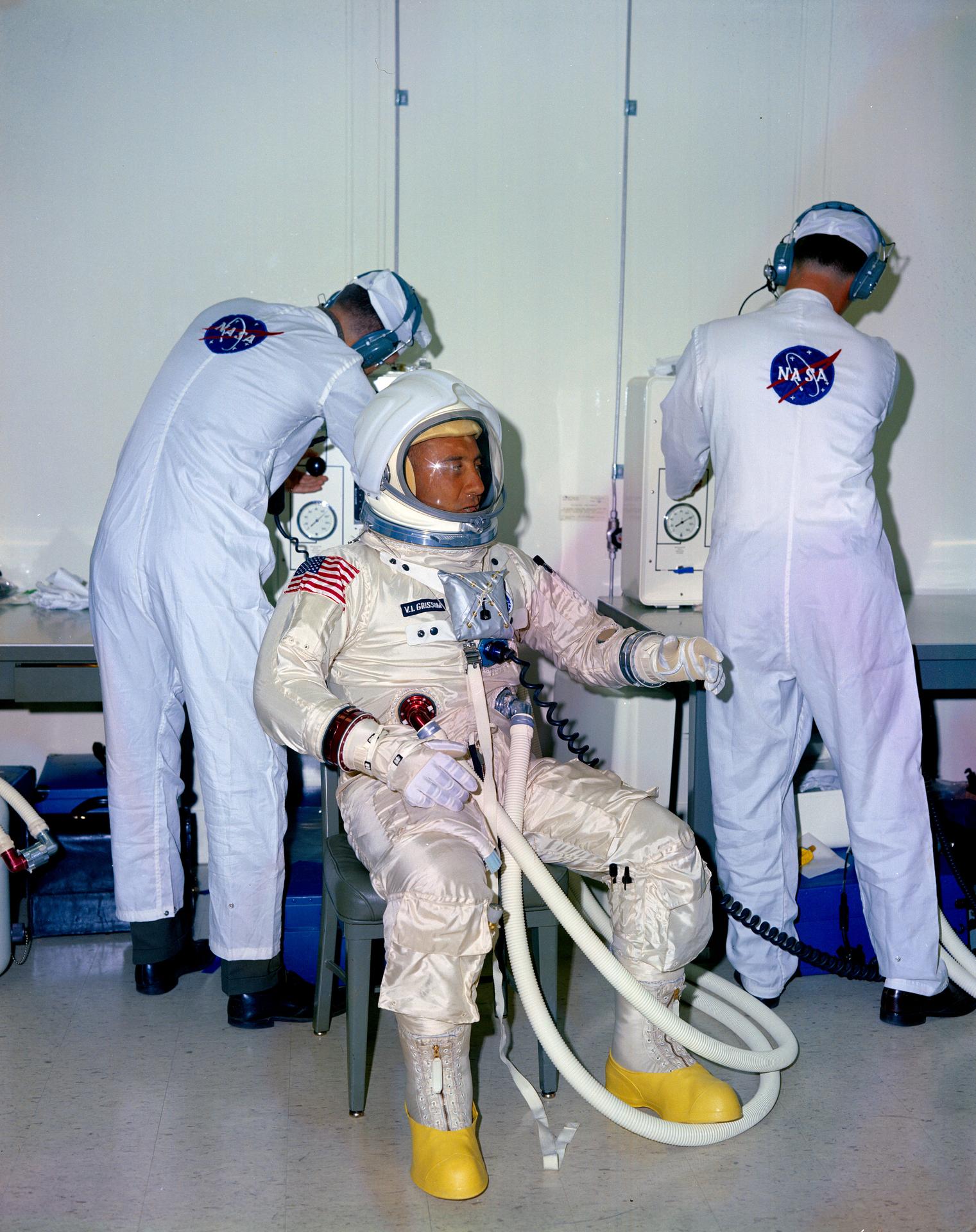 Gus Grissom gets suited up in the Apollo spacesuit