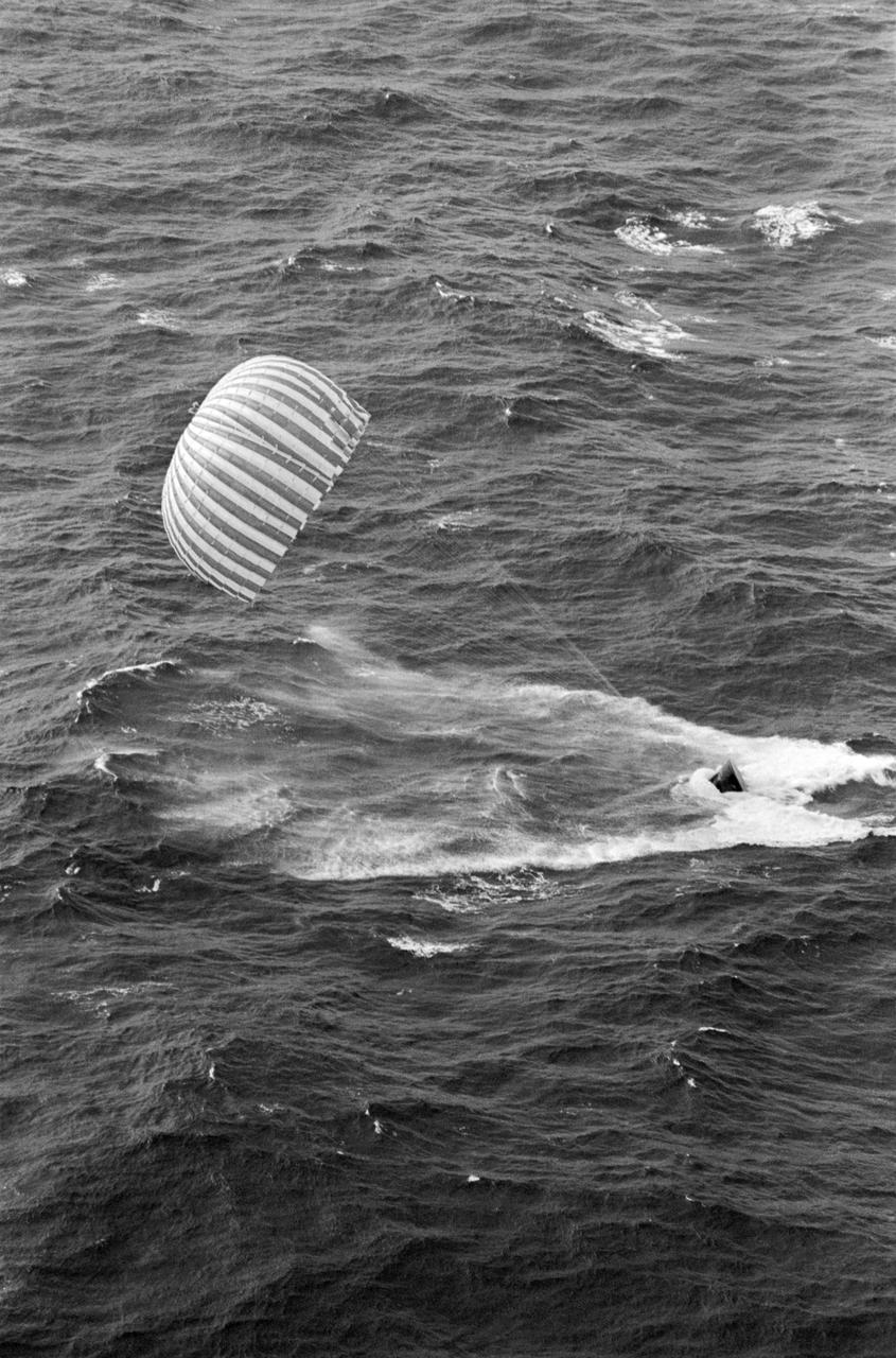 S66-59936 (15 Nov. 1966) --- The last Gemini spaceflight is concluded as the Gemini-12 spacecraft, with astronaut James A. Lovell Jr., command pilot, and Edwin E. Aldrin Jr., pilot, aboard, touches down in the Atlantic Ocean 2.5 nautical miles from the prime recovery ship, USS Wasp. Gemini-12 splashed down at 2:21 p.m. (EST), Nov. 15, 1966, to conclude a four-day mission in space. Photo credit: NASA