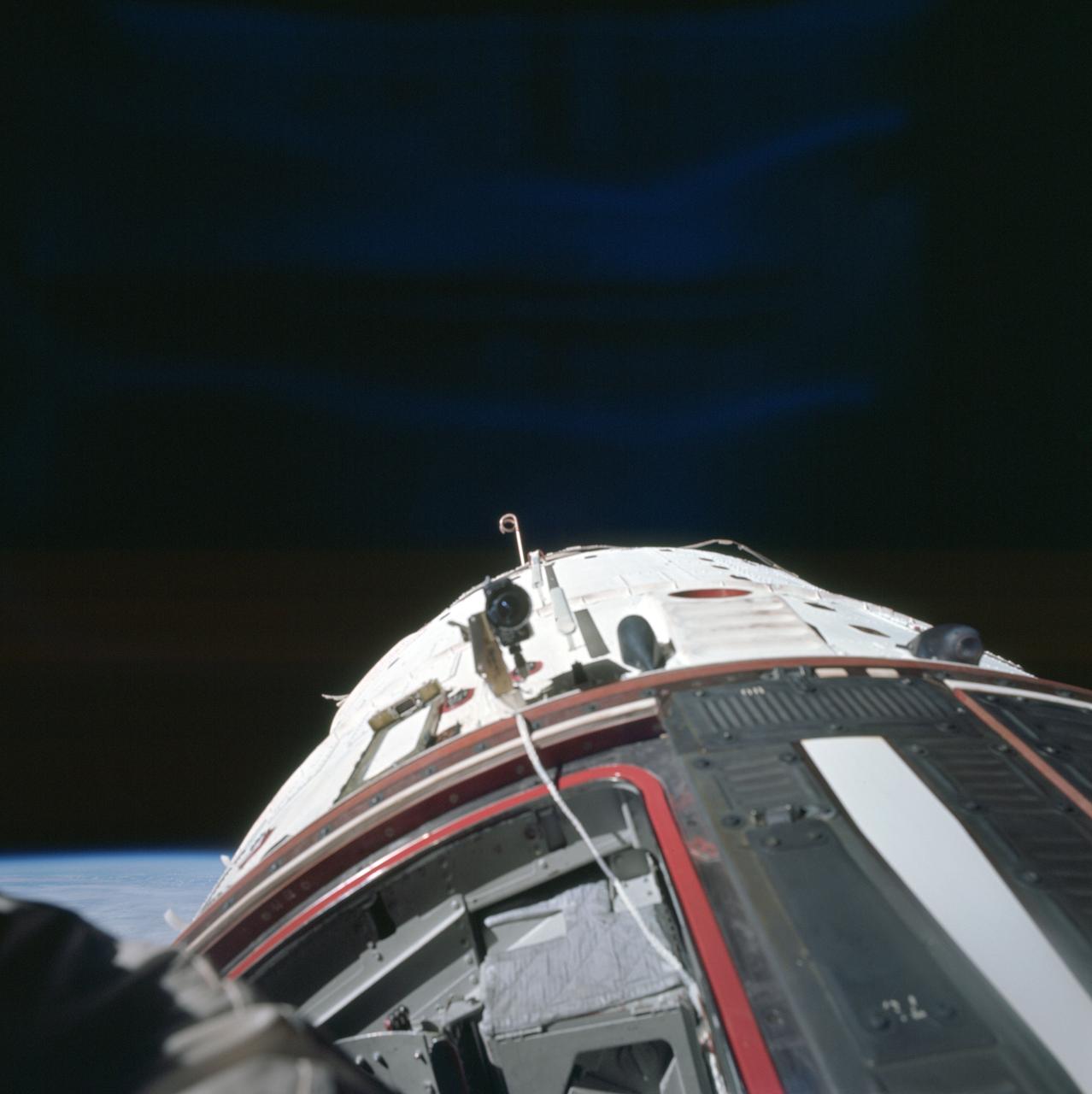 S66-62920 (13 Nov. 1966) --- Astronaut Edwin E. Aldrin Jr., pilot of the Gemini-12 spaceflight, took this picture of the Gemini-12 spacecraft during standup extravehicular activity (EVA) with the hatch open. This is a view to the rear showing the adapter section. Photo credit: NASA