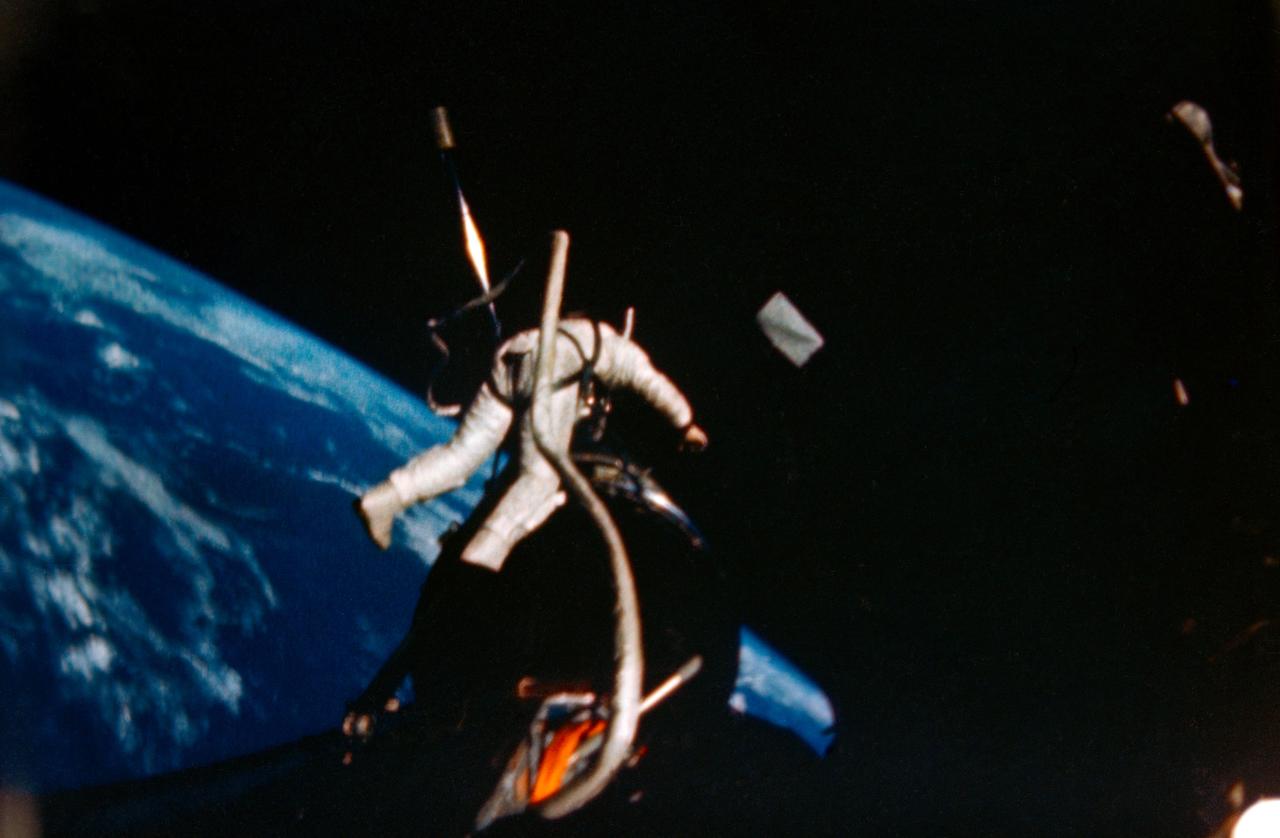 S66-62939 (12 Nov. 1966) --- Astronaut Edwin E. Aldrin Jr., pilot of the Gemini-12 spaceflight, performs extravehicular activity (EVA) during the second day of the four-day mission in space. Aldrin is at the Agena work station. Astronaut James A. Lovell Jr. was the command pilot. Photo credit: NASA