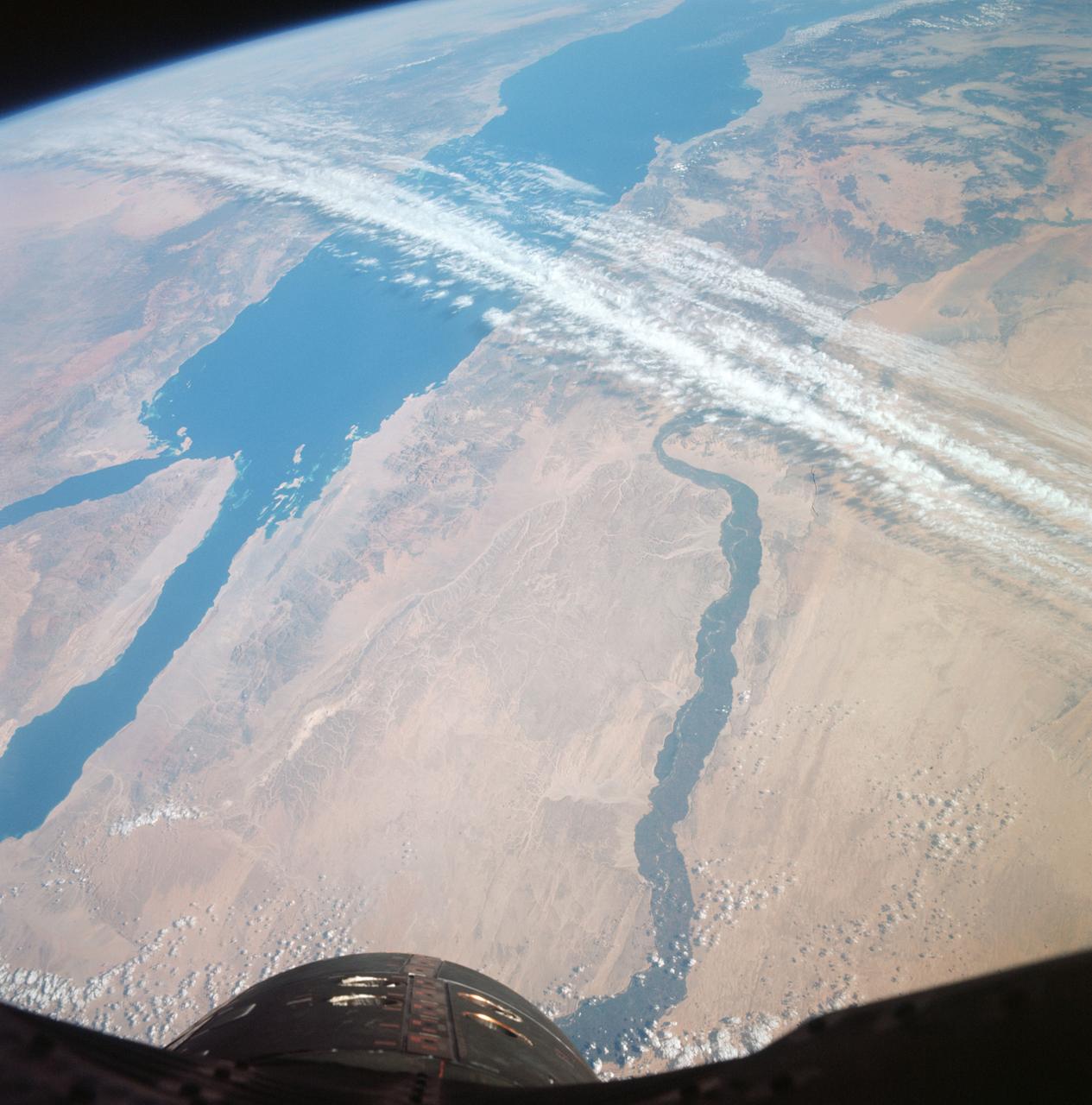 S66-63533 (14 Nov. 1966) --- United Arab Republic (Egypt) area as seen from the Gemini-12 spacecraft during its 39th revolution of Earth, looking southeast. Nile River is in center of picture. At bottom center is the Sinai Peninsula. Arabian Peninsula is at lower left. Large body of water is Red Sea. Gulf of Aqaba is on east side of Sinai Peninsula. Gulf of Suez separates Sinai from Egyptian mainland. Photo credit: NASA