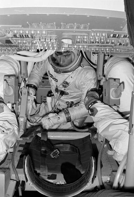 NASA image: Astronaut John Young in Command Module Simulator during Apollo Simulation